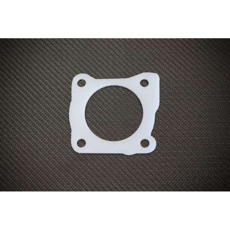 Torque Solution Thermal Throttle Body Gasket: DSM Eclipse / Talon / Laser 1st Gen 4G63 Turbo Only